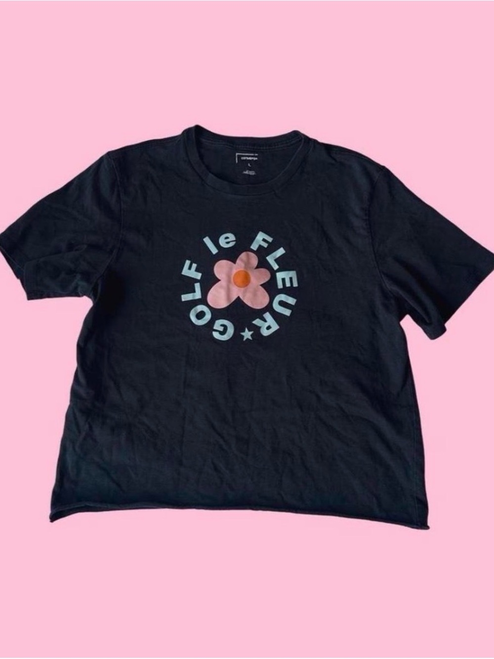 Golf Le Fleur Black Tee with Pink Flower and Light Blue Logo